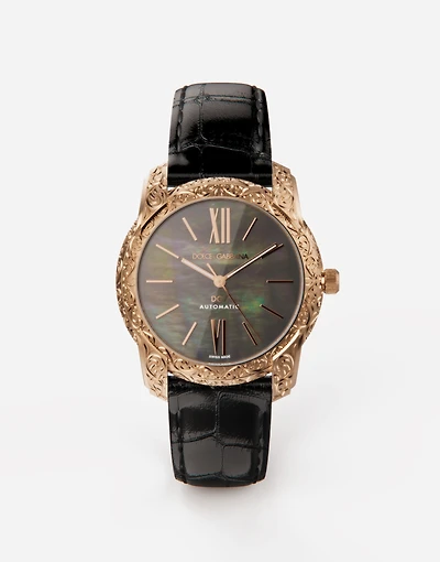 Gold and mother-of-pearl watch