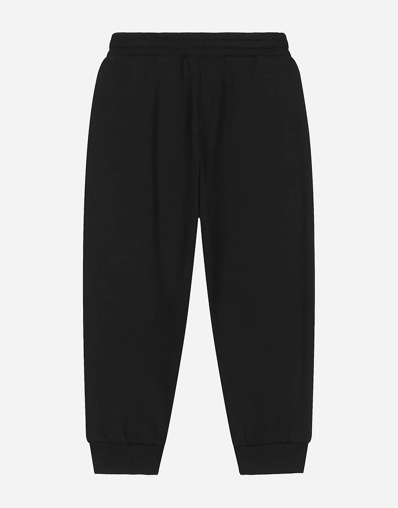 Jersey jogging pants with all-over flocked print
