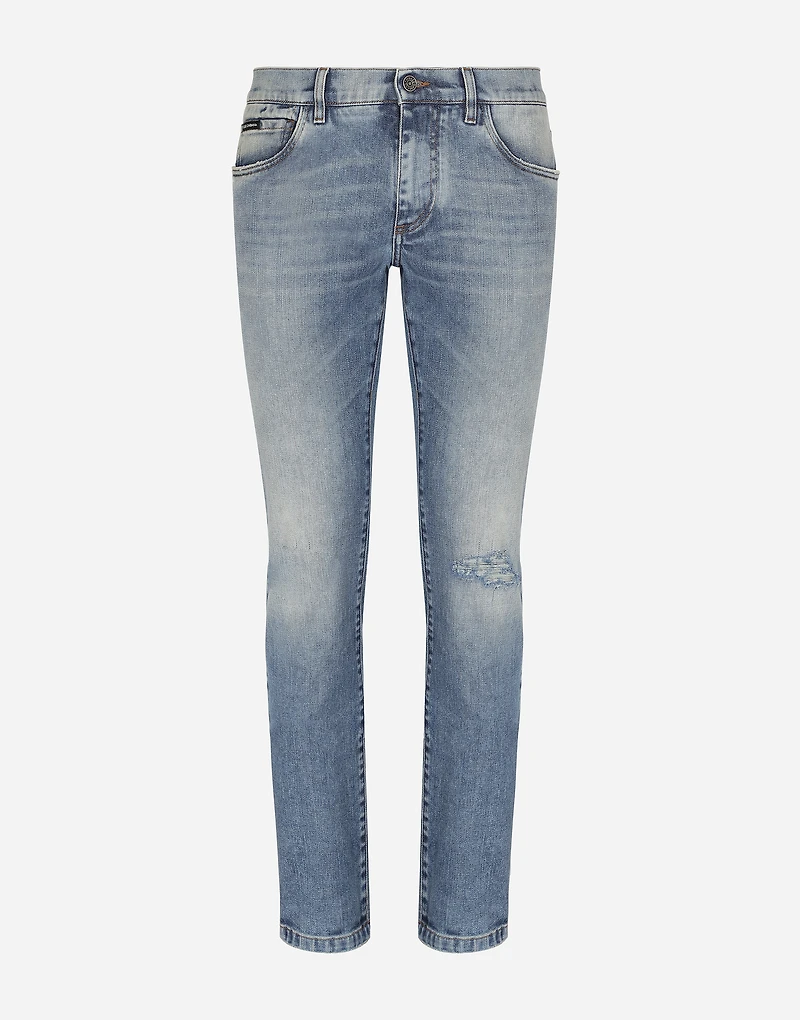 Light blue skinny stretch jeans with rips