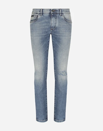Light blue skinny stretch jeans with rips