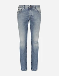 Light blue skinny stretch jeans with rips