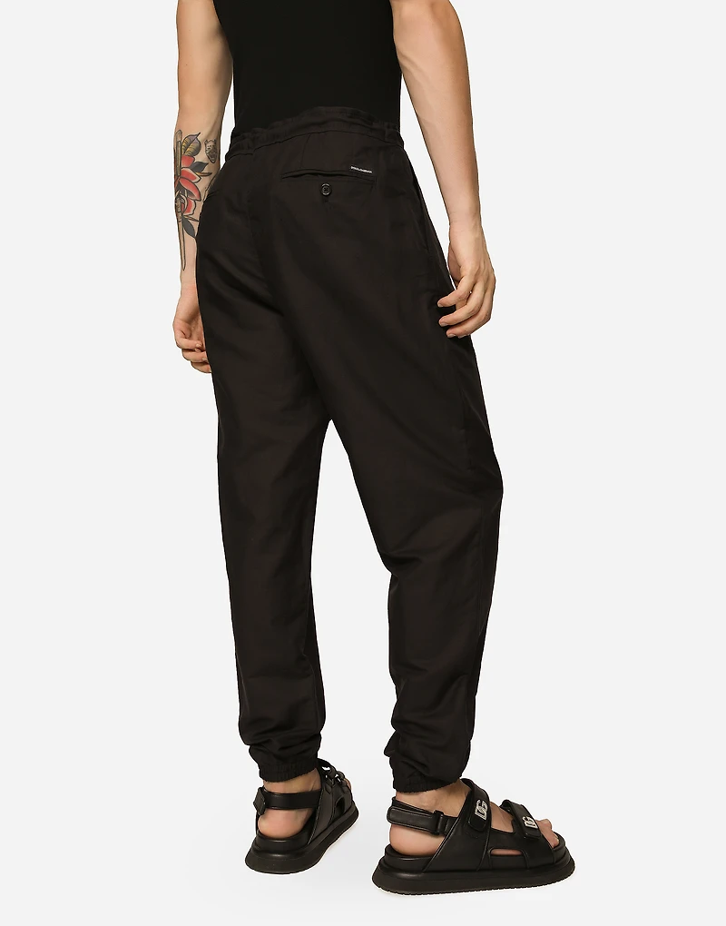 Linen and cotton jogging pants with logo label