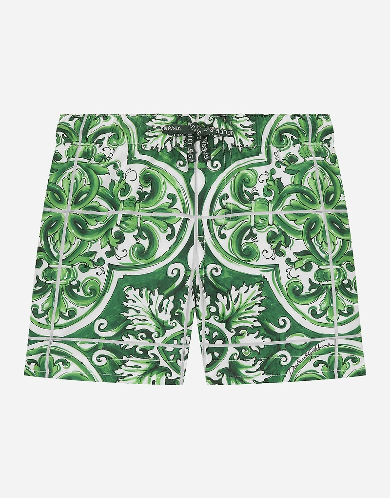 Nylon swim trunks with green majolica print