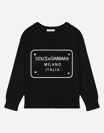 Wool pullover with branded tag