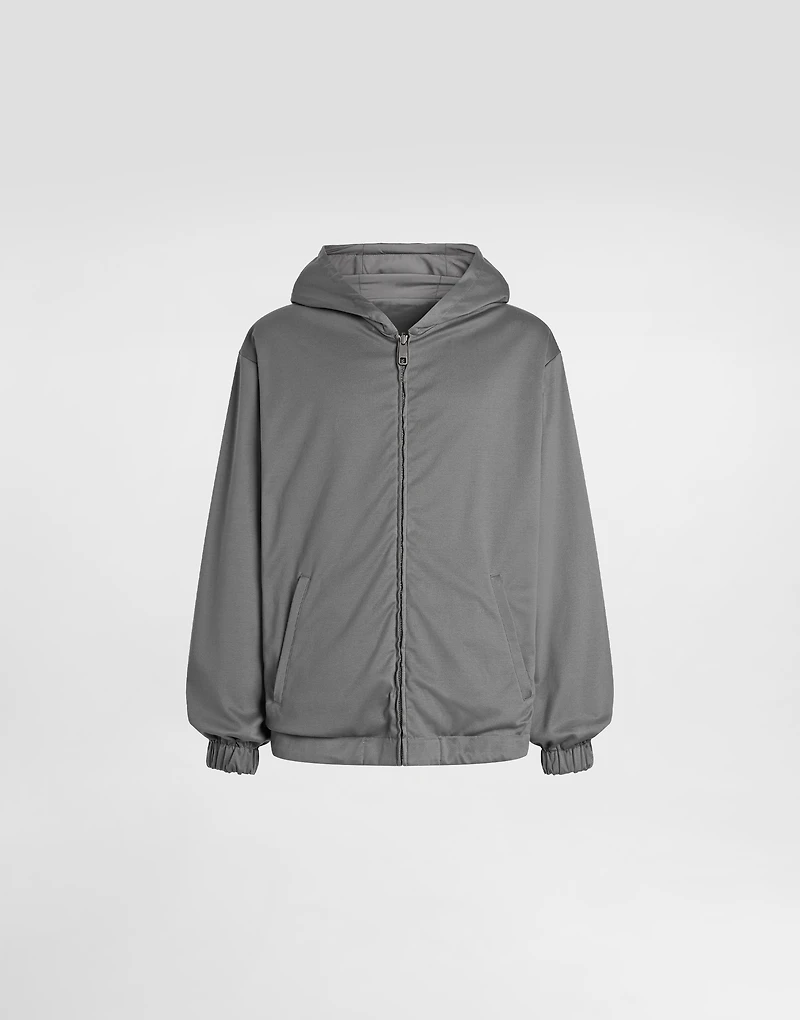 Technical fabric sports jacket with hood