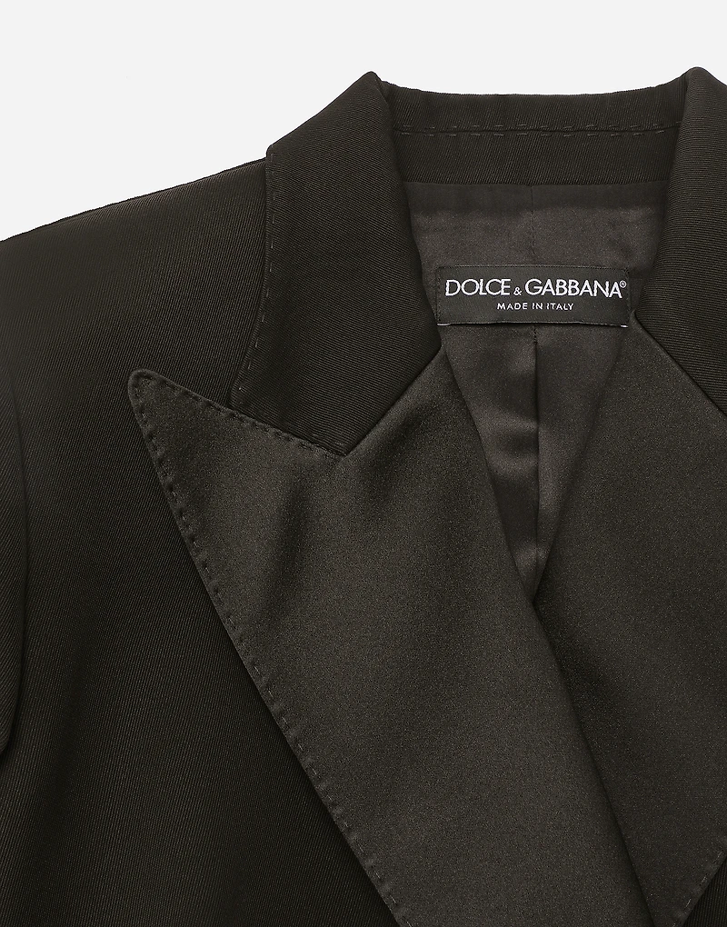 Double-breasted woolen jacket with side vents