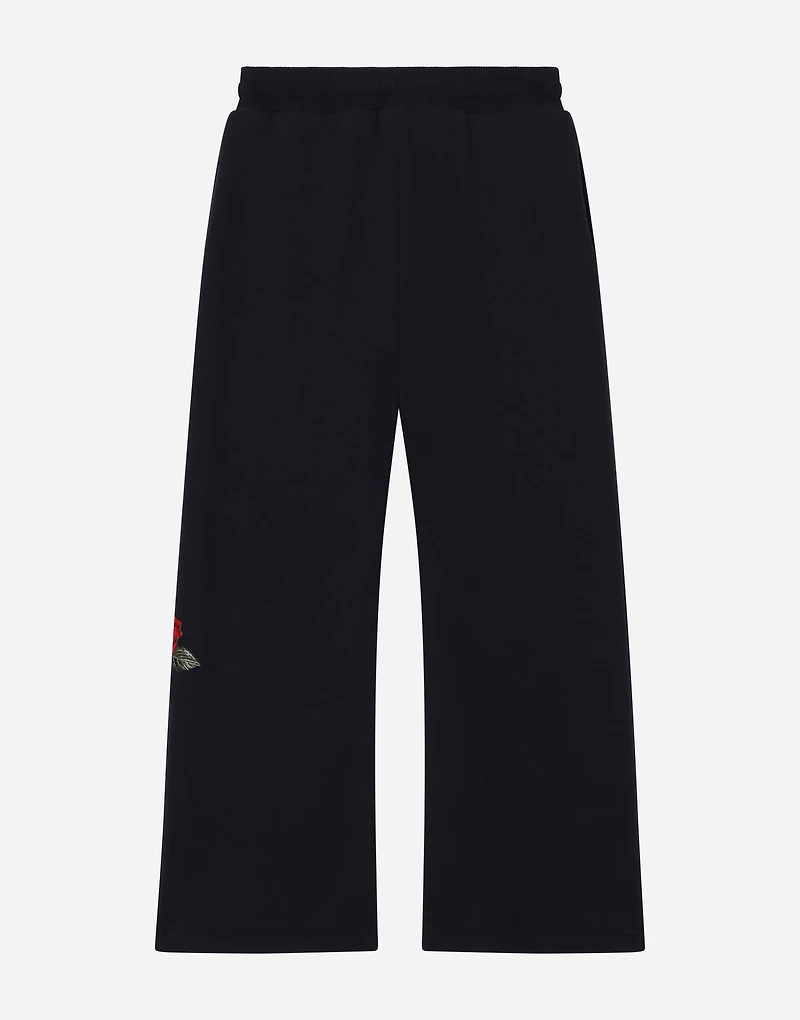 Jersey jogging pants with logo and rose print