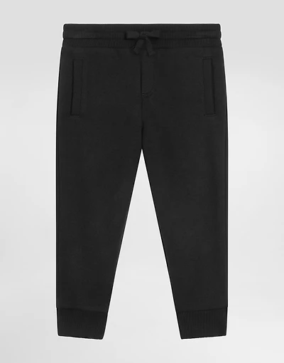 Fleece trousers with DG logo plaque