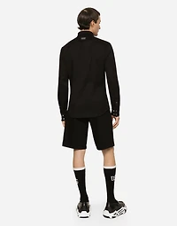 Coated black stretch denim shirt