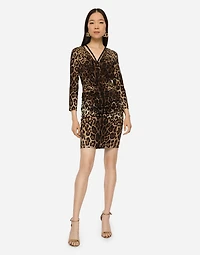 Short charmeuse dress with leopard print and tie