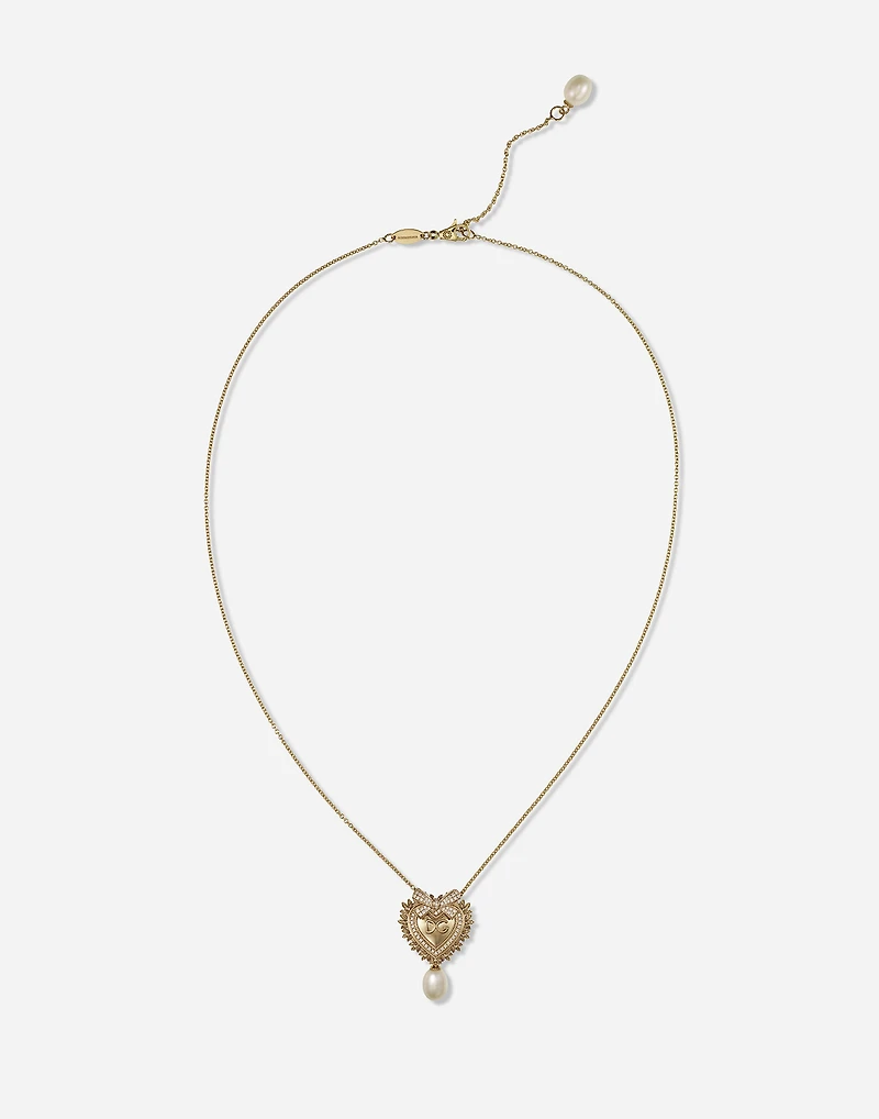 Devotion Necklace
18 carat yellow gold, diamonds and pearls