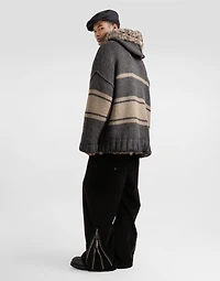 Knitted jacket with fur