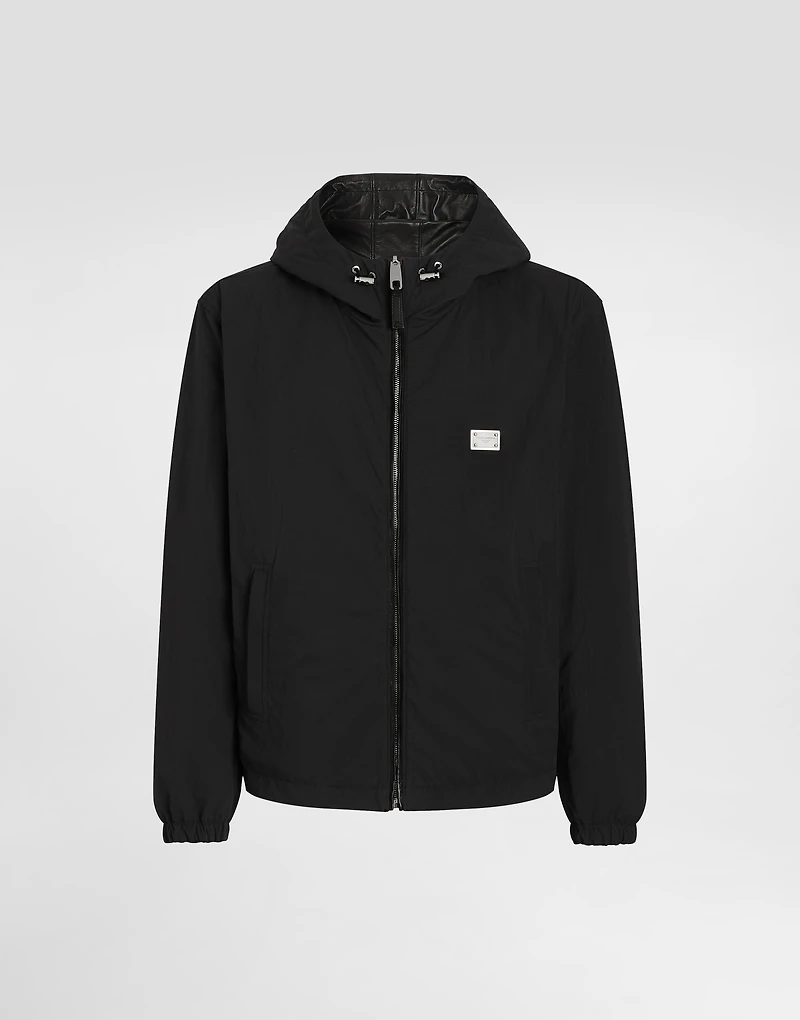 Leather and fabric jacket with reversible hood