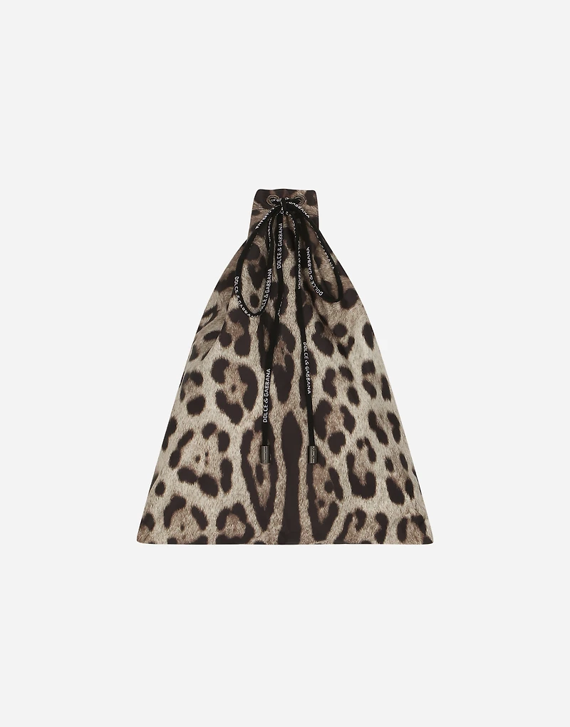 Short swim trunks with leopard print