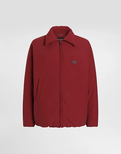 Padded technical fabric jacket with tag
