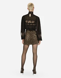 Georgette and lace turtle-neck blouse