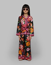 Twill shirt with floral print over a black background