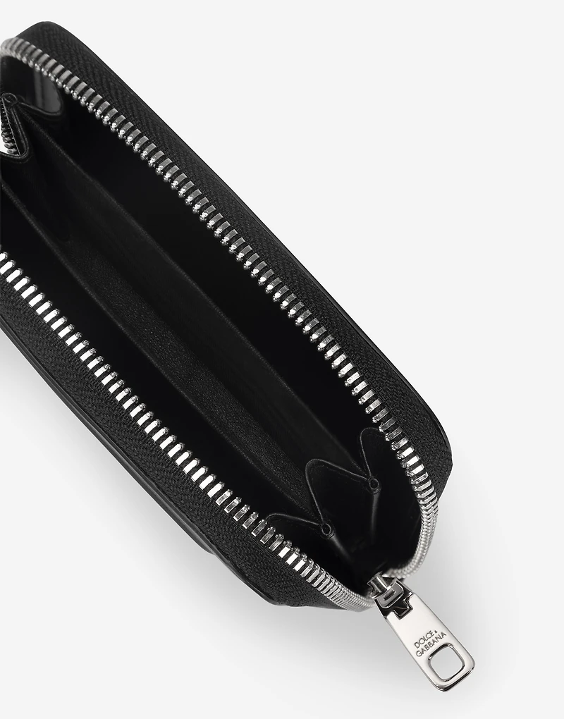 Small zip-around wallet in calfskin with raised logo