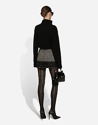 Short micro-tweed skirt with lace insert