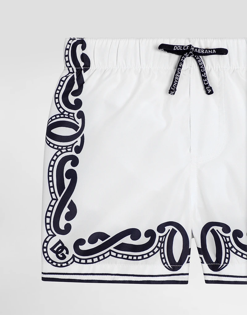 Fabric swim trunks with bandanna print