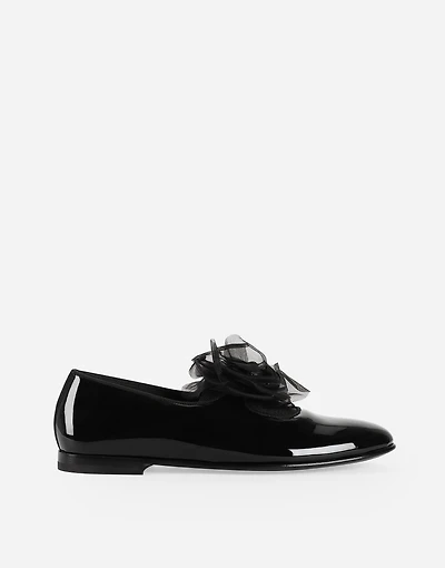 Patent leather slippers with flower appliqué