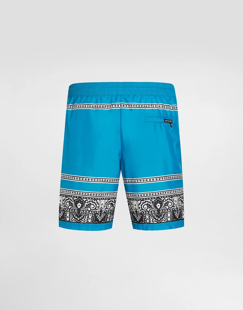 Mid-length swim trunks with bandanna print