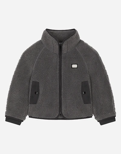 Faux fur jacket with branded tag