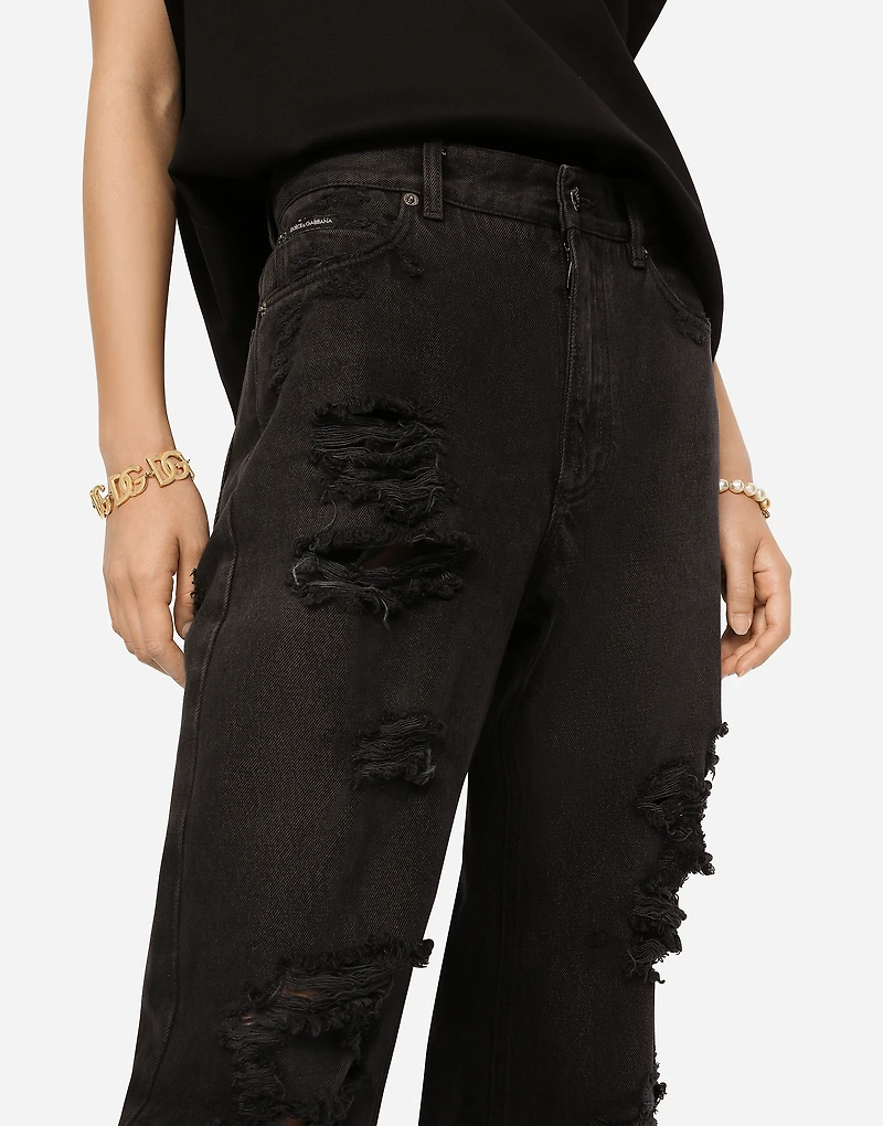 Flared jeans with ripped details