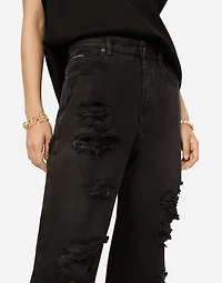 Flared jeans with ripped details