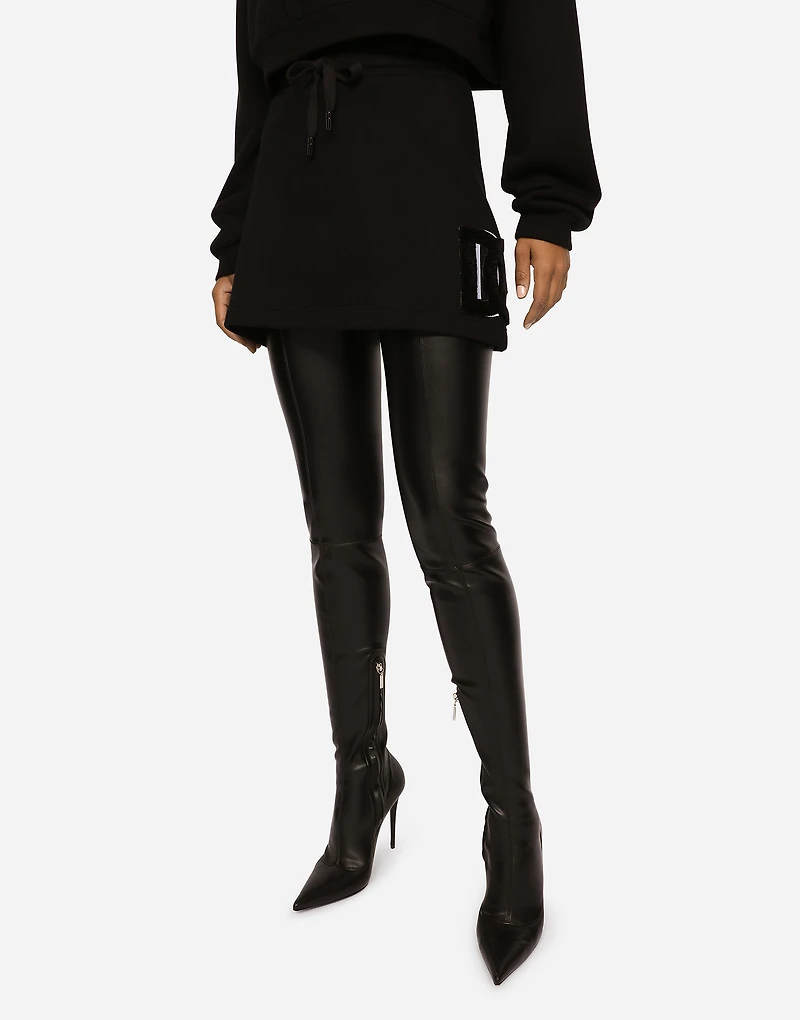 Jersey miniskirt with logo patch