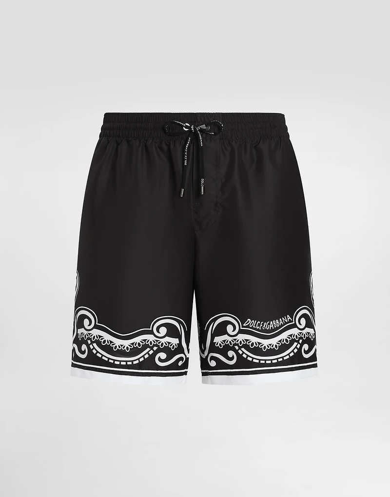 Mid-length swim trunks with bandanna print