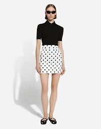 Short charmeuse skirt with polka-dot print