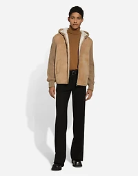 Sheepskin jacket with knit inserts and hood