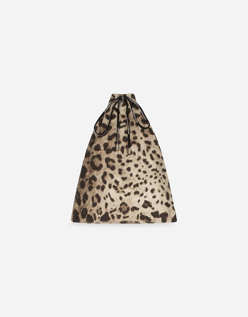 Mid-length swim trunks with leopard print