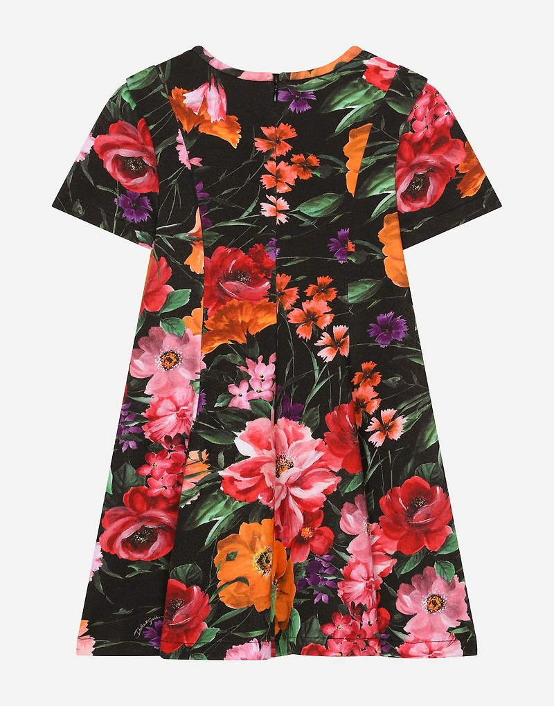 Neoprene dress with floral print over a black background