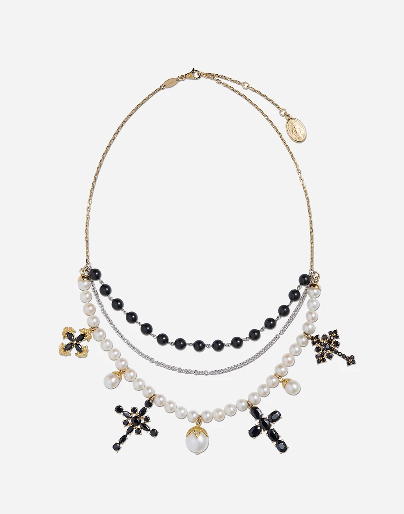 Sicily Necklace
18-carat yellow and white gold and black sapphires