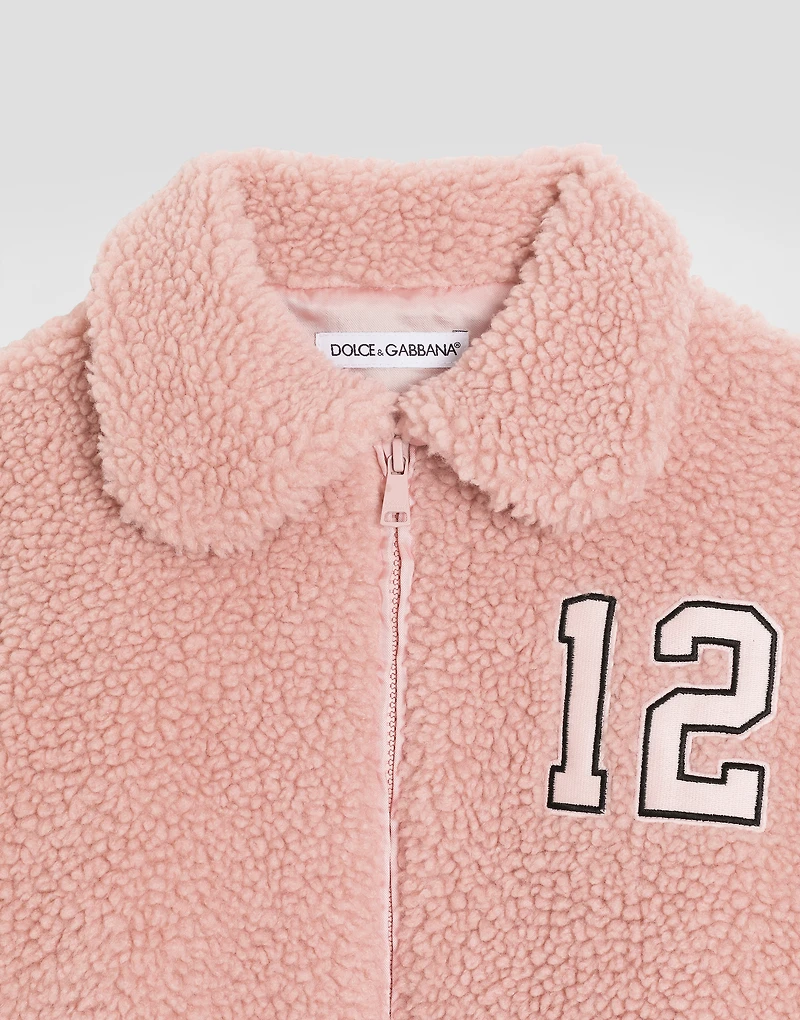 Faux fur jacket with patch