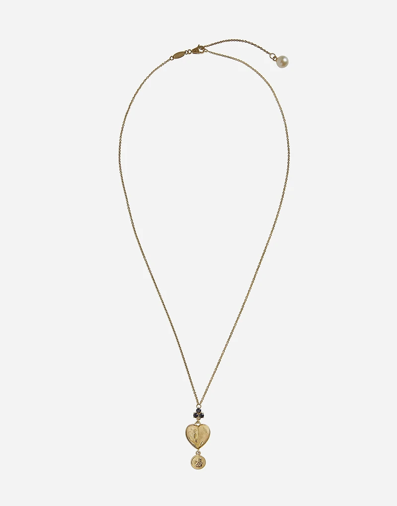 Sicily Pendant
18-carat yellow gold and black sapphires
