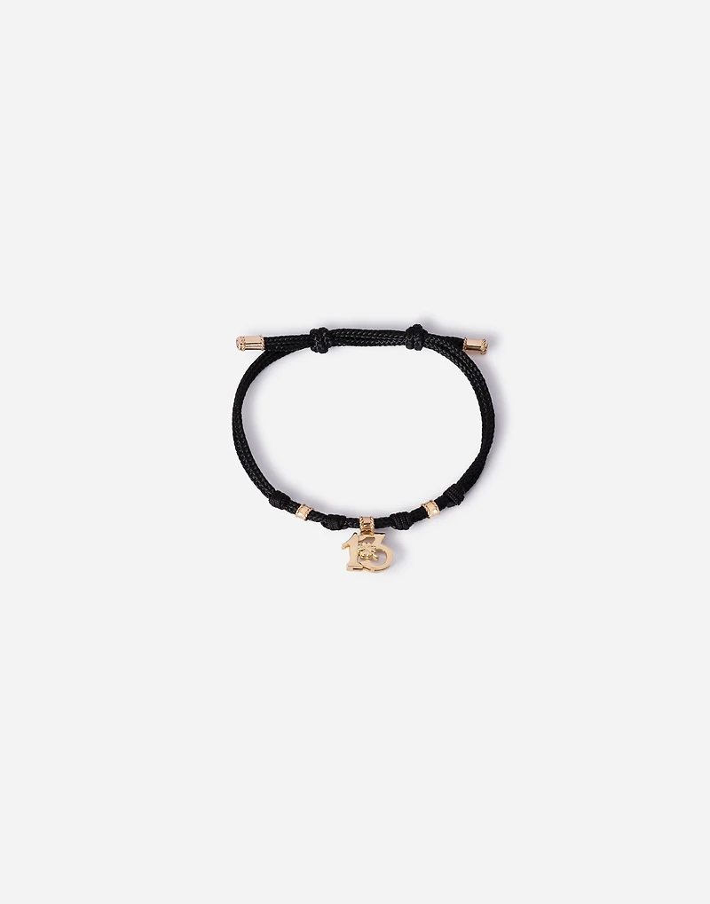  Good Luck Bracelet fabric with a pendant in 18 carat yellow gold