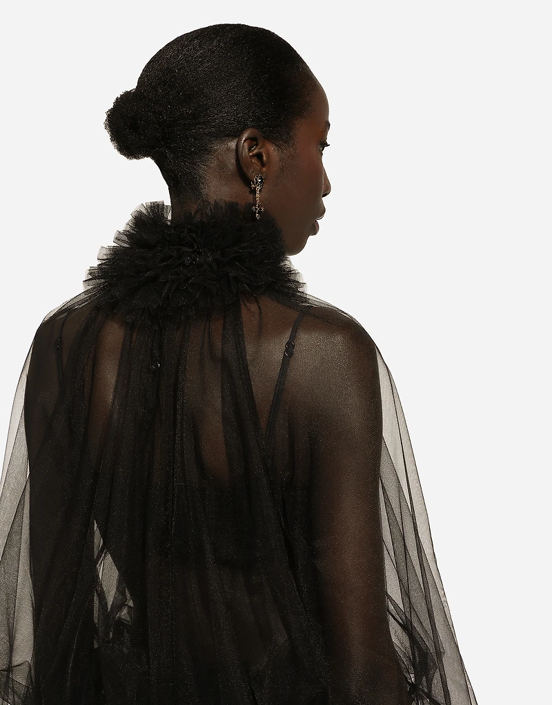 Tulle blouse with ruffles on the neck and cuffs