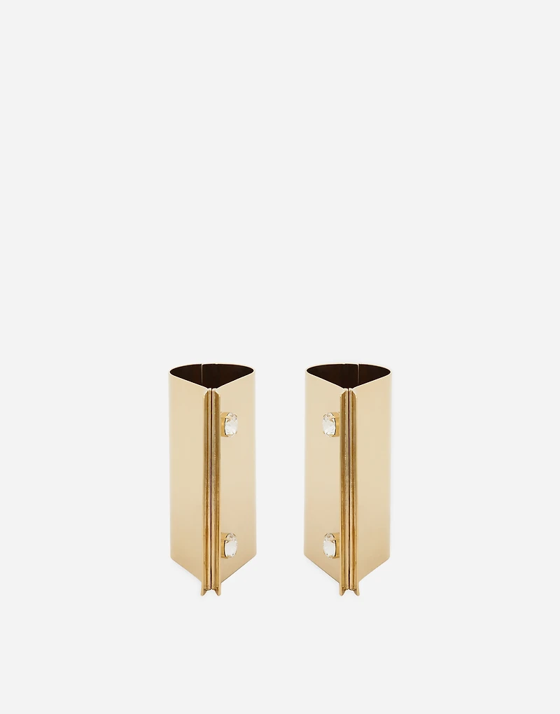 Rigid metal cuffs and rhinestone-detailed buttons