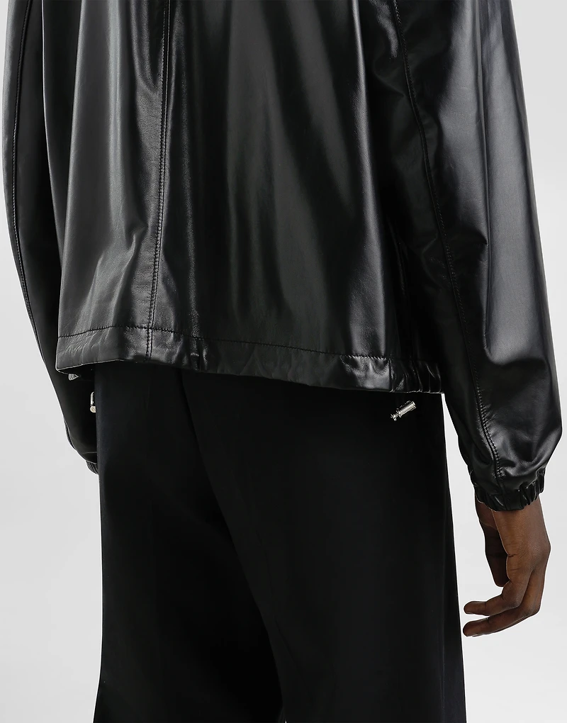 Leather and fabric jacket with reversible hood