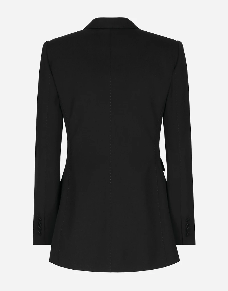 Double-breasted woolen jacket with flower appliqué