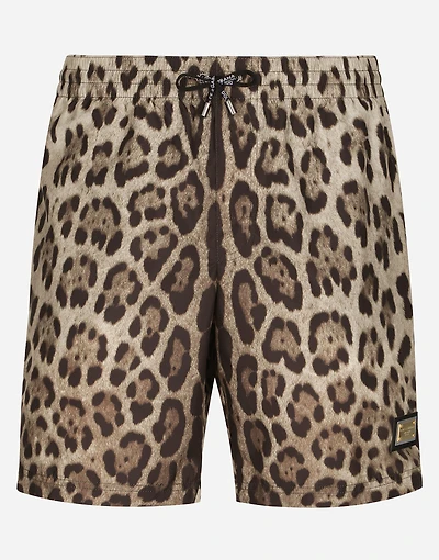 Mid-length swim trunks with leopard print