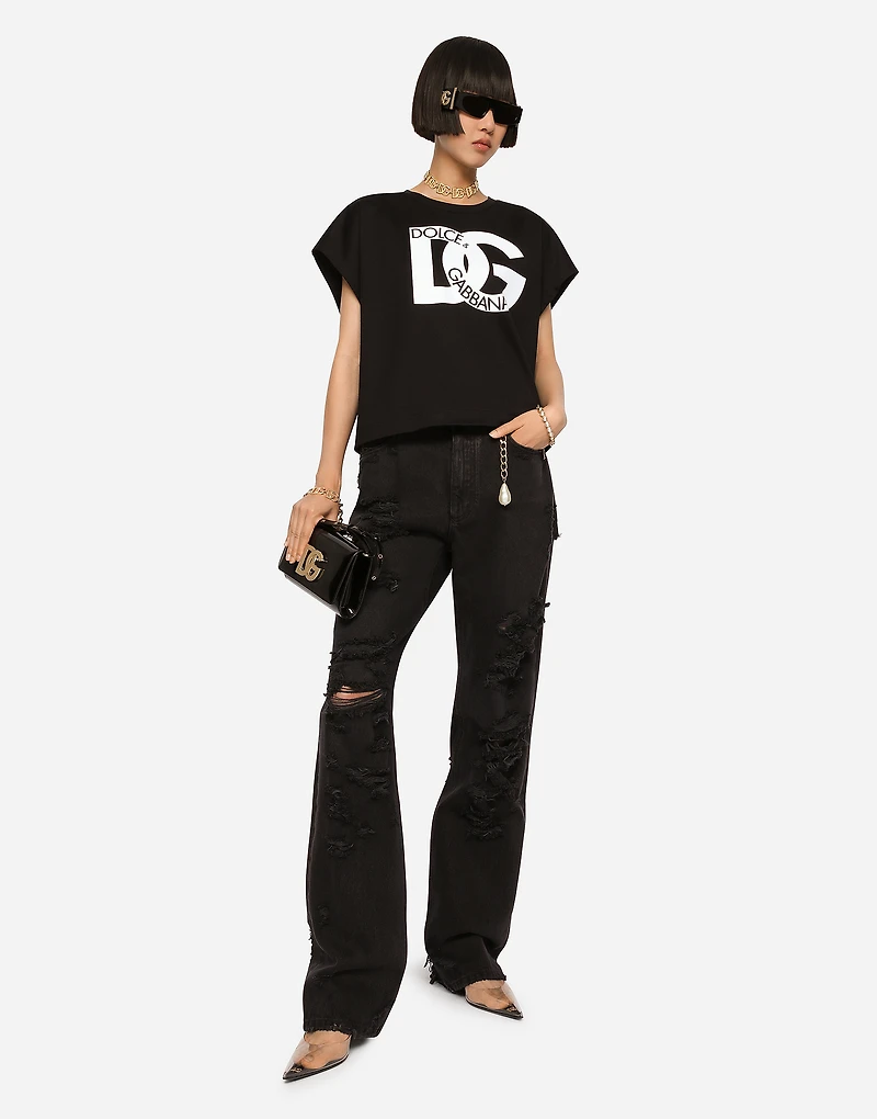 Flared jeans with ripped details