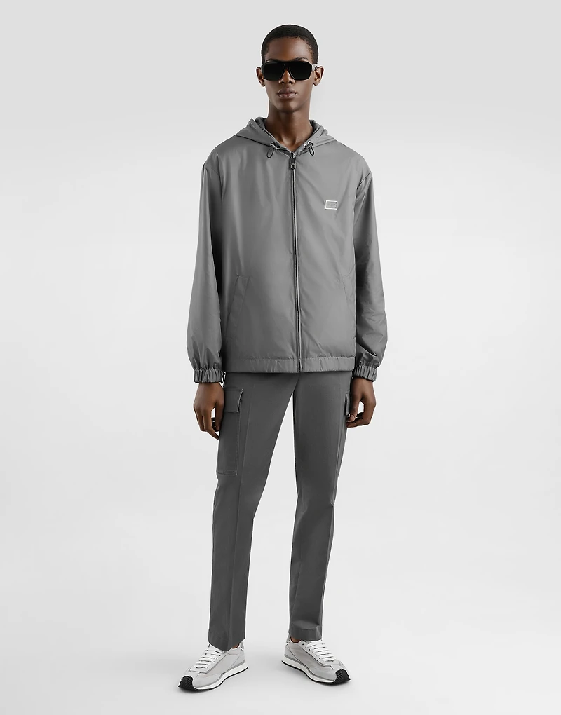 Technical fabric sports jacket with hood