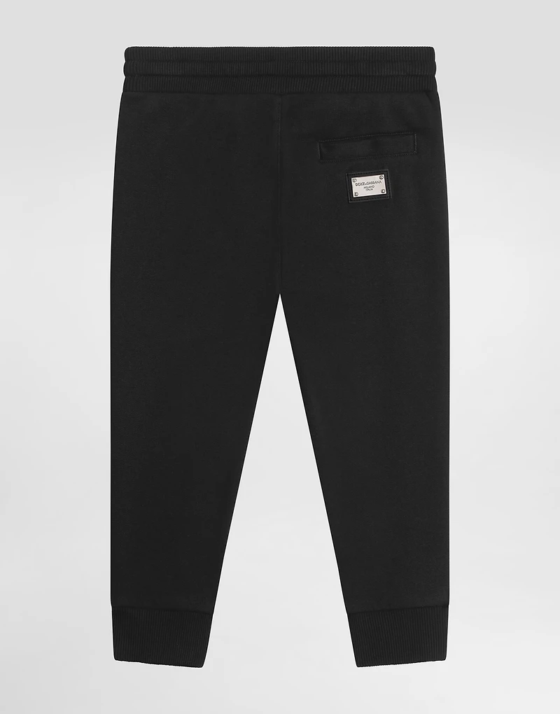 Fleece trousers with DG logo plaque