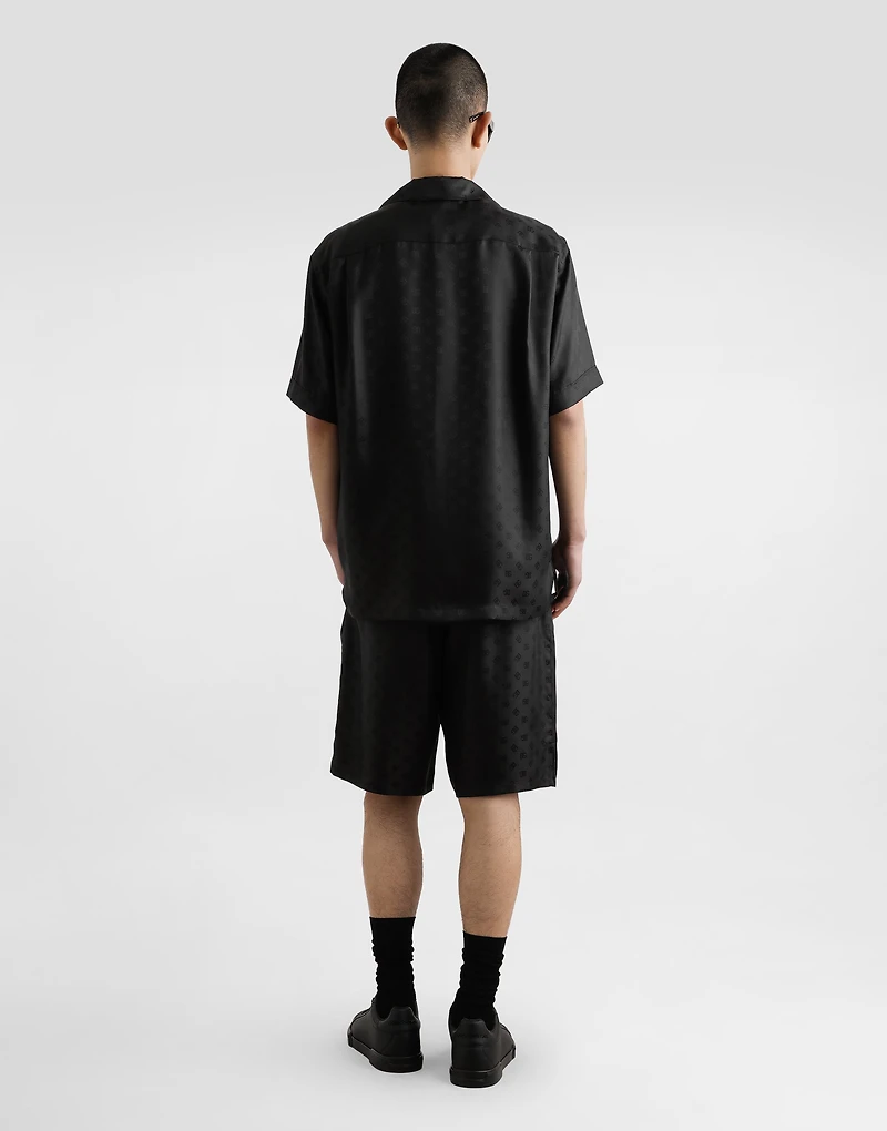 DG logo jacquard trousers