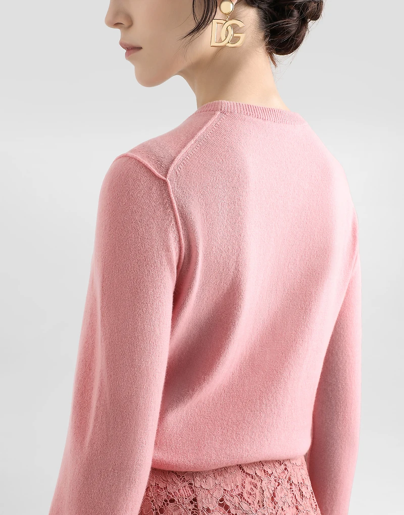 Cashmere sweater with inside-out seams
