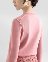 Cashmere sweater with inside-out seams